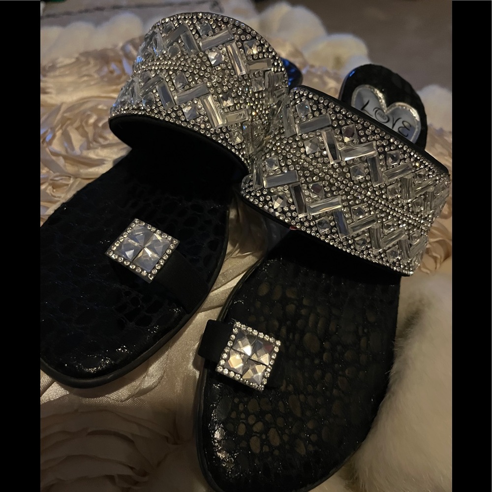 Black and rhinestone sandals.